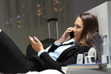 Wall Mural - Executive having business phone conversation in an hotel room