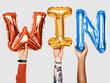 © Rawpixel.com - Hands showing win balloons word