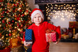 gay boy dressed as Santa Claus with gifts for Christmas