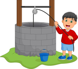 Boy take water in the well
