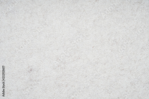 Fotografía light gray or off-white felt background with fiber texture