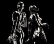 Two fashion robots on black background.