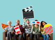 © Rawpixel.com - Group of diverse friends holding movie emoticons