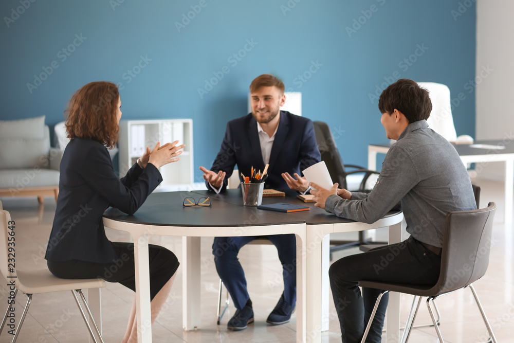 Meeting of business team working in office