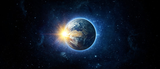 Wall Mural - panoramic view of the earth, sun, star and galaxy. sunrise over planet earth, view from space. eleme