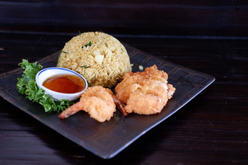 Wall Mural - fried rice with chicken on wood table