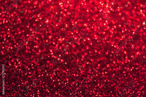 Cuadros en Lienzo Blurred shiny red background with sparkling lights.