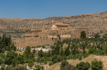 Wall Mural - Mardin, Turkey - few kilometers away from Midyat, the Deyrulzafaran Assyrian Monastery is one of the best preserved examples of Syriac Orthodox monastery in the world