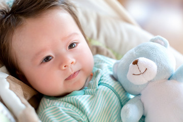 Wall Mural - Little baby boy lying down and resting