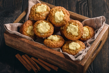 Pumpkin muffins with cream cheese stuffing.