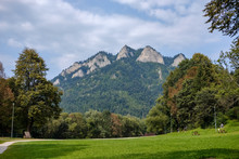 Western Carpathian Tatra Mountain Skyline With Green Fields And Forests In Foreground