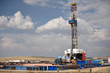 Land-based oil and gas exploration, drilling rig and well site in the energy-rich Powder River Basin.