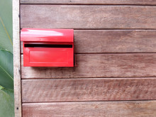 Exterior Background Wooden Wall Texture With Red Mailbox