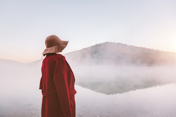 Canvas Print - Girl standing by the lake