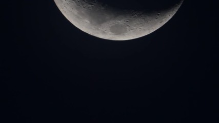 Wall Mural - moon video where it set in the dark, taken with 1500 mm of focal length telescope, isolated in black