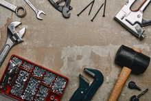 Top View Of Various Carpentry Tools On Old  Surface Background