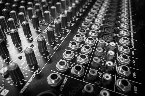 Fotografie, Obraz Closeup Professional Audio Mixing Console Inputs and Outputs