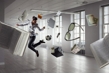 Wall Mural - Playing football in office. Mixed media