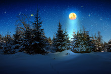 Christmas Background With Stars And Big Moon In Winter Forest.