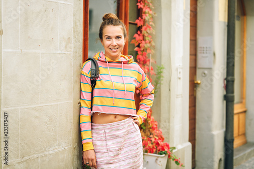Photographie Portrait of young beautiful woman wearing stripe sweatshirt