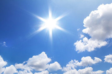 Wall Mural - Sun in blue sky.