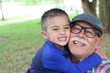 Grandfather having a fun with his grandson