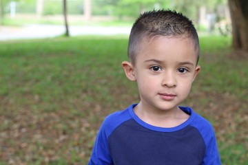 serious little boy with copy space