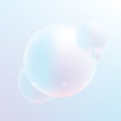 Soft pastel colored gradient spheres floating on a light blue and purple background