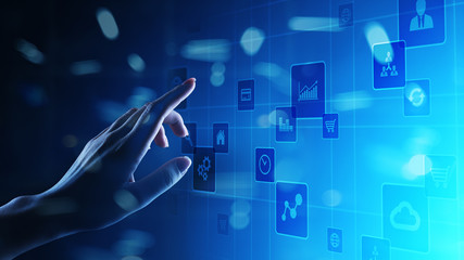 Application icons on virtual screen. Technology and business concept.
