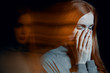 © Photographee.eu - Blurred picture of young beautiful redhead girl with depression covering her mouth