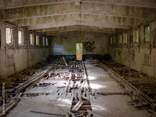 Abandoned Bowling Alley With Destroyed Wooden Floor In Old