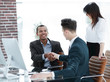© yurolaitsalbert - handshake business people behind a Desk in the office