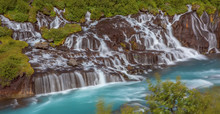 The Hraunfossar - An Amazing Blue Cascade Waterfall In Iceland