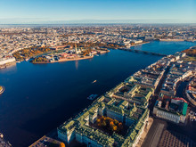 Top View Aerial Drone On Buildings Palace Embankment, Wide Neva River With Boats, Bridge. Hare Island And Peter And Paul Fortress.