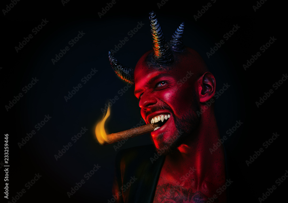 demon smoking cigar Stock Photo