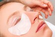 Eyelash care treatment procedures. Woman doing lashes lamination