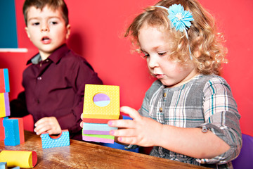 Wall Mural - The preschoolers group in kindergarten together, Nursery group play with block ,