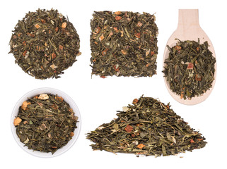 Wall Mural - Mix of green tea with sencha tea and strawberry slices on white background.