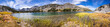 Panoramic view of alpine lake surrounded by the rocky ridges of the Eastern Sierra mountains; Long Lake, Little Lakes Valley trail, John Muir wilderness, California