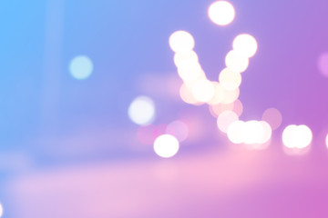 Canvas Print - blurred light on road in city with bokeh abstract background