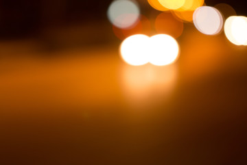 Canvas Print - blurred light on road in city with bokeh abstract background
