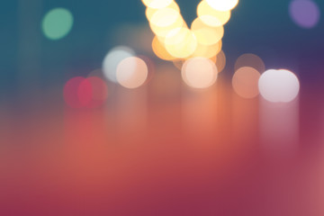 Canvas Print - blurred light on road in city with bokeh abstract background