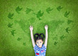 World peace day concept with peaceful mind kid resting in clean natural environment on eco friendly world map green lawn