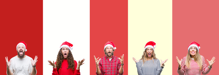 Wall Mural - Collage of group of young people wearing chrismast hat over isolated background crazy and mad shouting and yelling with aggressive expression and arms raised. Frustration concept.