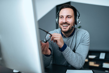 Wall Mural - Close-up image of customer service representative at work.