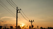 © taira42 - an old Power pole with line on Silhouette environment, High level of noise. sun rise or sun set time