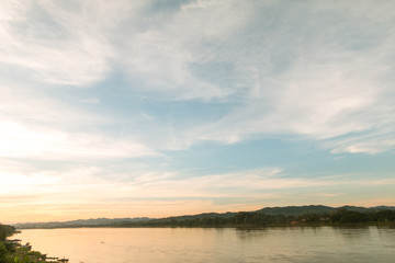 Clouds over river in sunrise time, Mae Khong river in Thailand