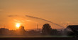Field irrigation at sunset
