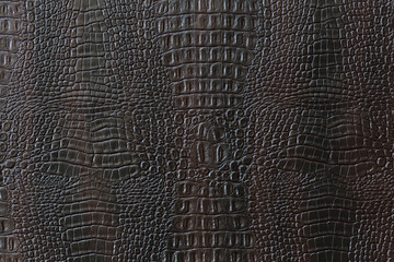 Wall Mural - Texture of crocodile artificial leather of brown color.