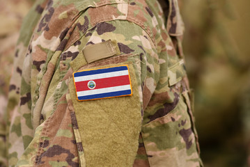 Costa Rica flag on soldiers arm. Republic of Costa Rica troops (collage)